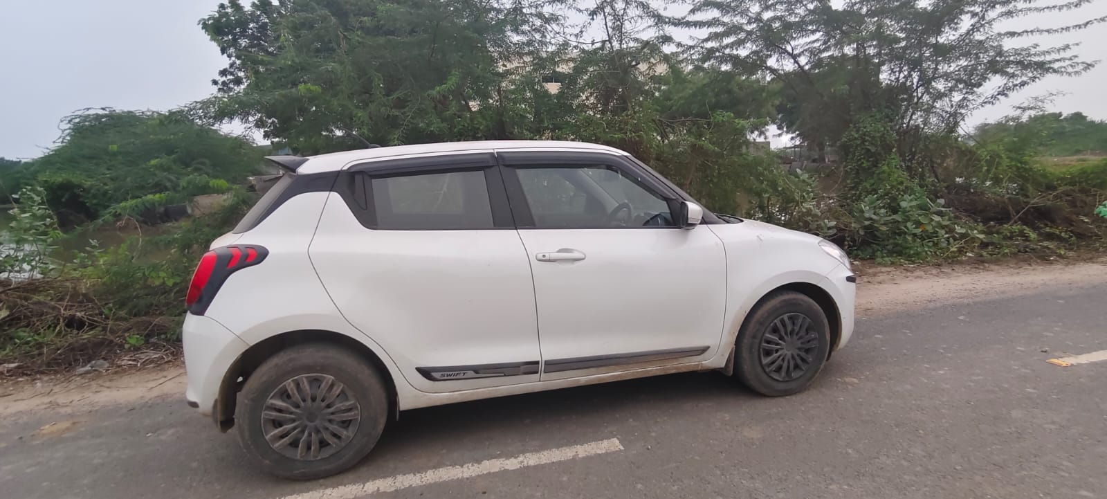 2024 Maruti Suzuki Swift VXi Hatchback 2 years for sale in Vishal Parking Ahmedabad — photo 4
