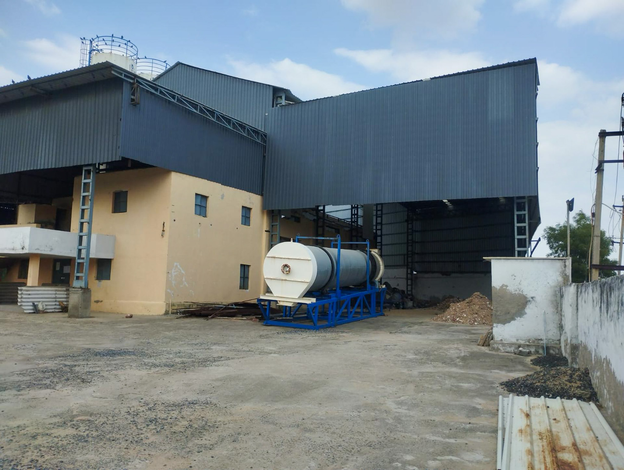 Industrial Plot with Factory Building for sale in VILLAGE BUDASAN, KADI, MEHSANA Kadi
