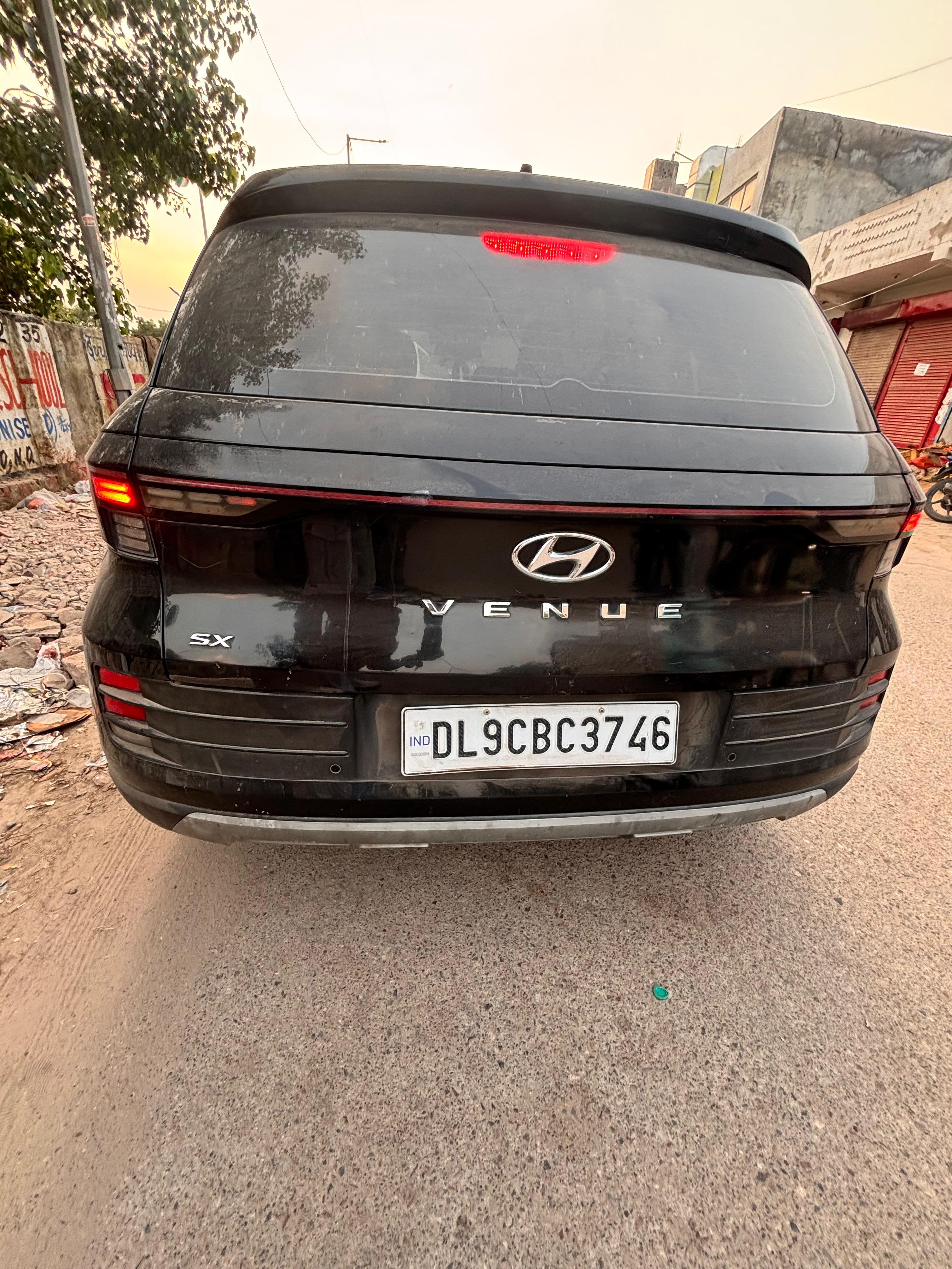 2023 Hyundai Venue E 1.2 Petrol MT Compact SUV 70429 km 3 years for sale in KUBER CONSULTANTS New Delhi — photo 2